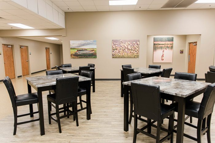 tables and chairs in day room - Victory Addiction Recovery Center - Lafayette addiction treatment center