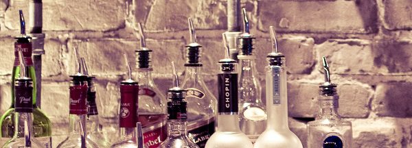 liquor bottles - three common symptoms of alcohol abuse - victory addiction recovery center - alcohol addiction treatment in lafayette louisiana