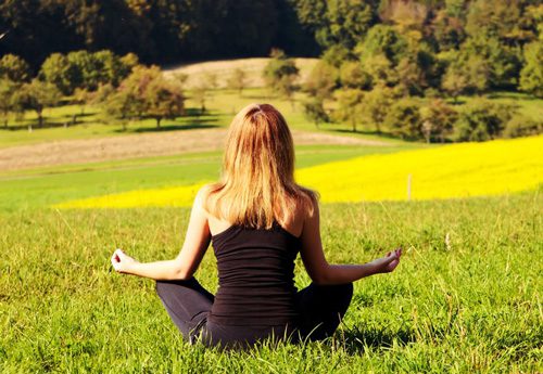 stress management in addiction recovery - woman doing yoga - victory addiction recovery center