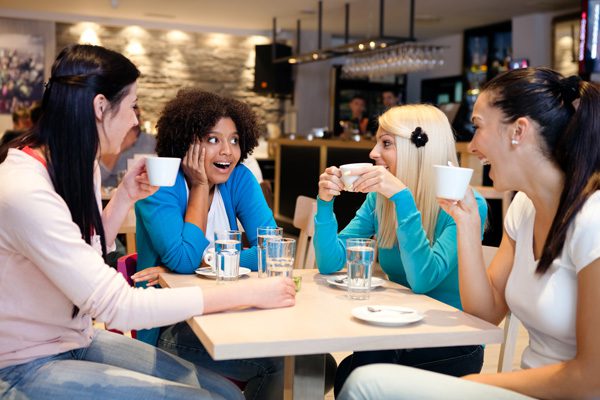 socializing sober - friends at a coffee house - victory addiction recovery center