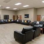 day room in treatment facility with couches and recliners - Victory Addiction Recovery Center - IOP in Louisiana