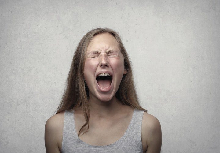 stigma mad sad girl screaming addiction treatment
