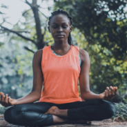 A woman in a meditation pose.