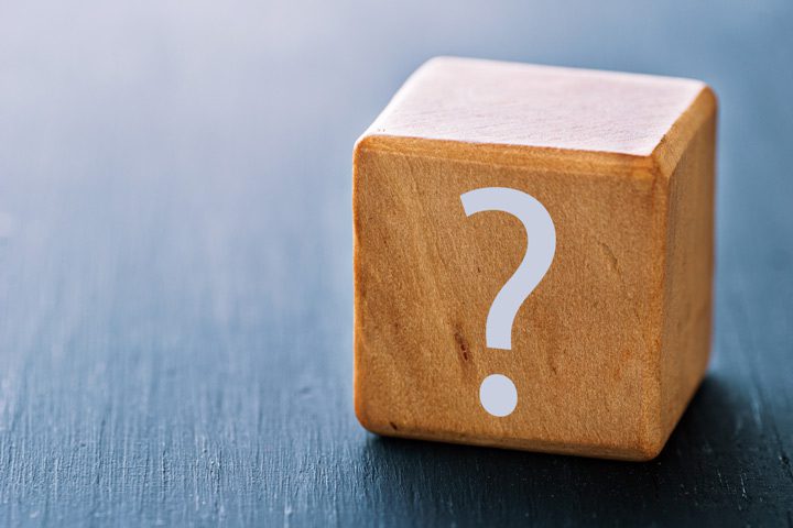 wooden block with a white question mark on it - overdose