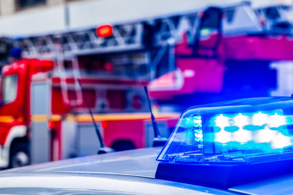 Close-up of a police car with flashing blue lights