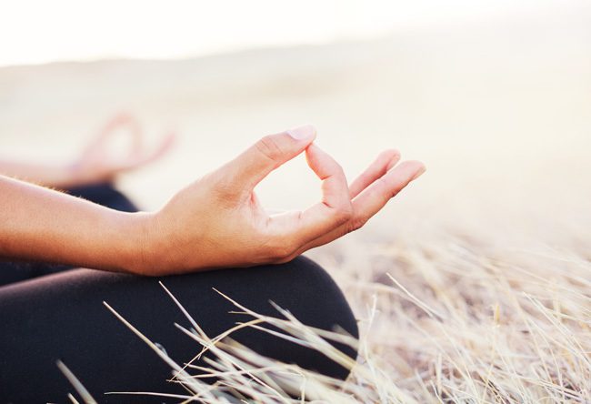 hands on knees meditating
