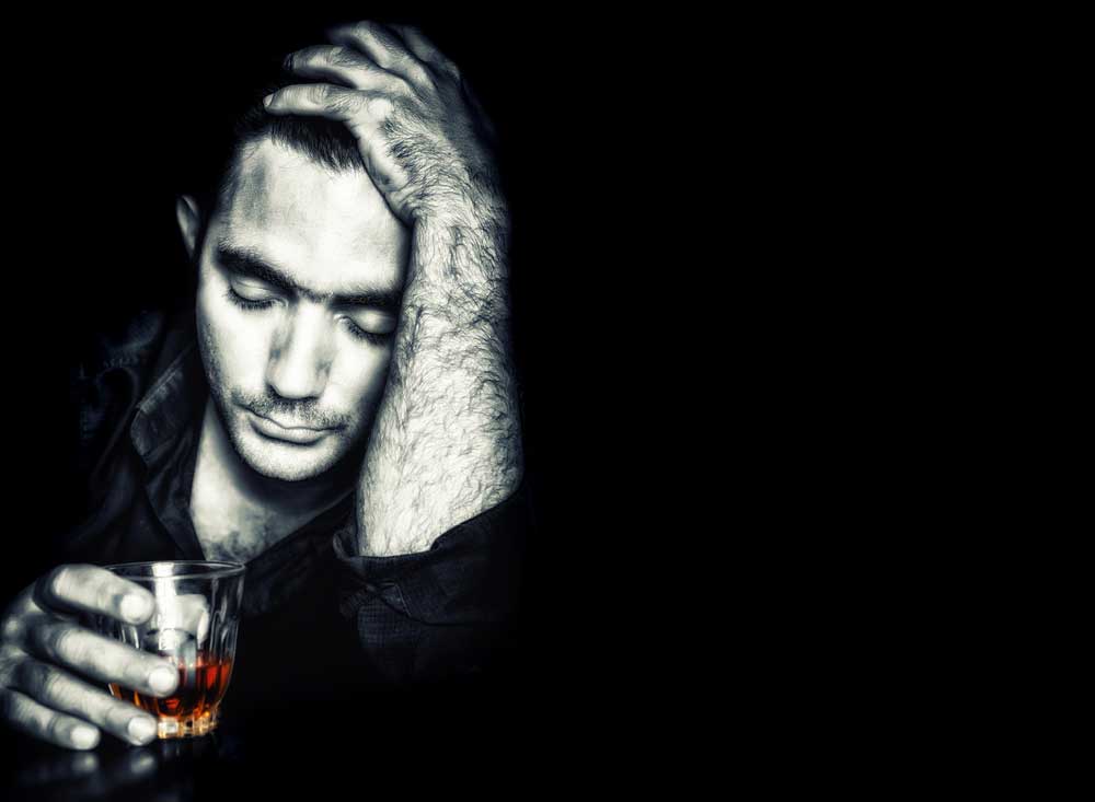 emotional portrait of a young man suffering from alcoholism - alcohol withdrawal symptoms - Victory Addiction Recovery Center Lafayette Louisiana Alcohol Treatment and Rehab center