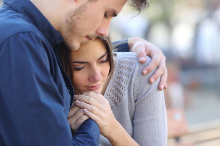 blackout drinking - man consoling wife - victory addiction recovery center