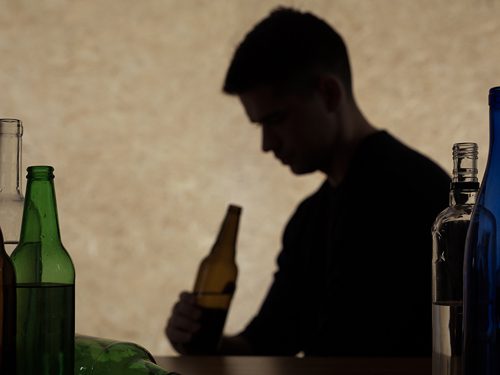 is alcohol a drug - man drinking alcohol - victory addiction recovery center