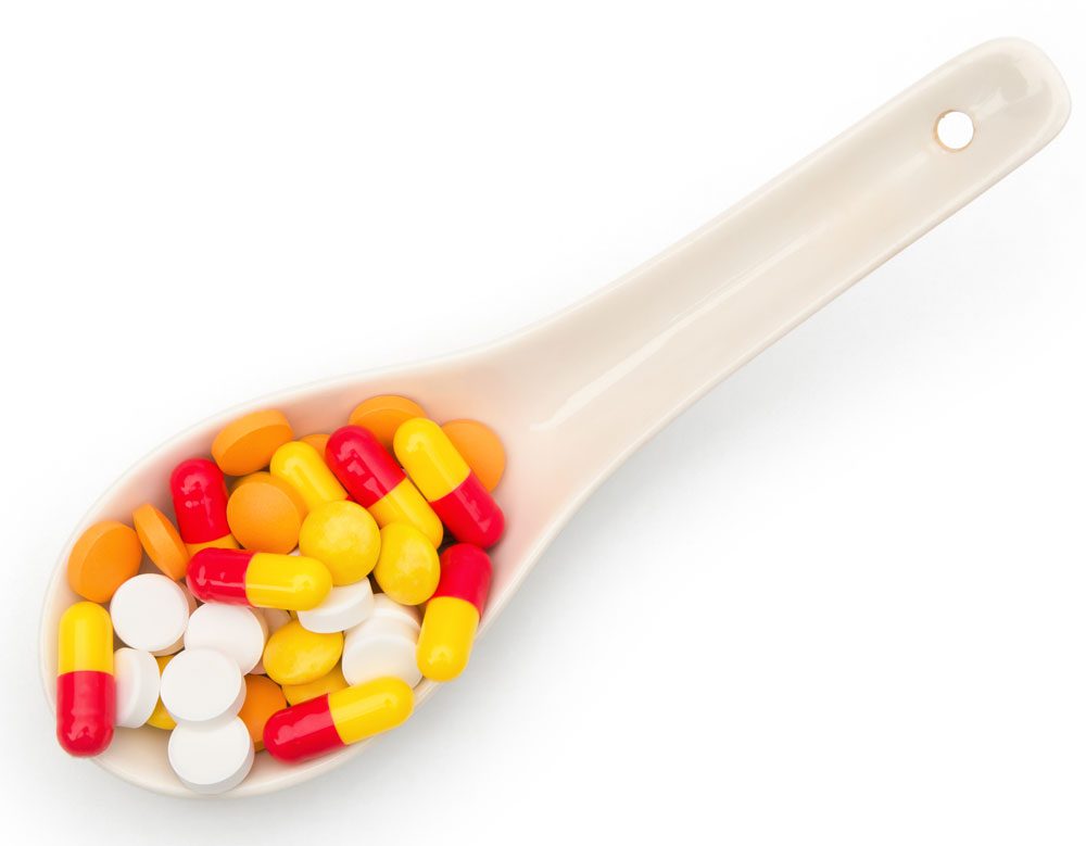 prescription pills in a spoon - prescription drug abuse - victory addiction recovery center - lafayette lousiana drug and alcohol detox