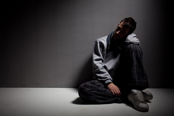progression of addiction - depressed man - victory addiction recovery center