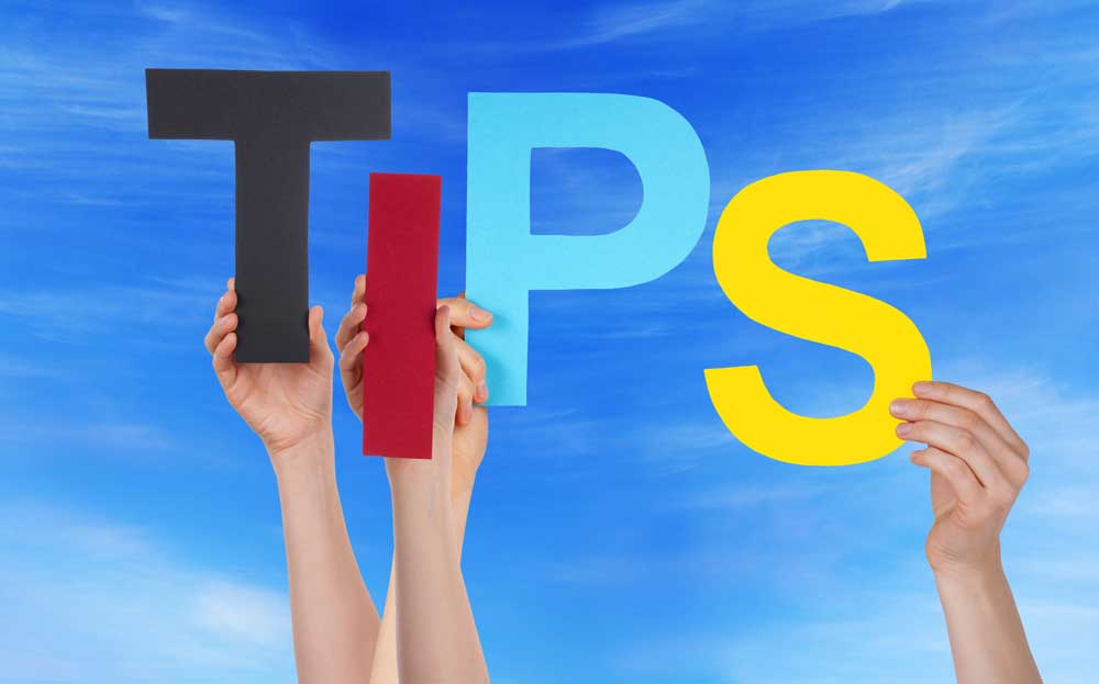 hands holding up letters spelling TIPS - 4 tips for living with a recovering addict - victory addiction recovery center - lafayette louisiana drug addiction treatment center